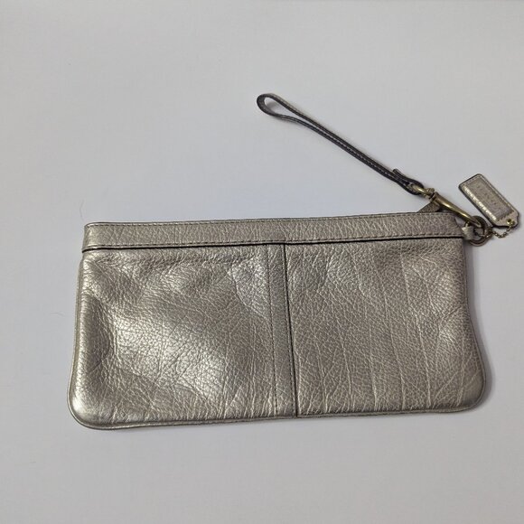 Like new Coach Metallic Champagne Gold Wristlet Clutch - Picture 5 of 16